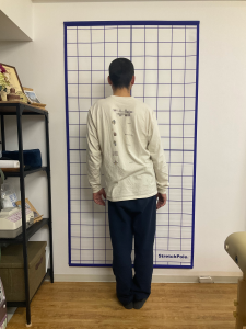 腰の曲がった男性